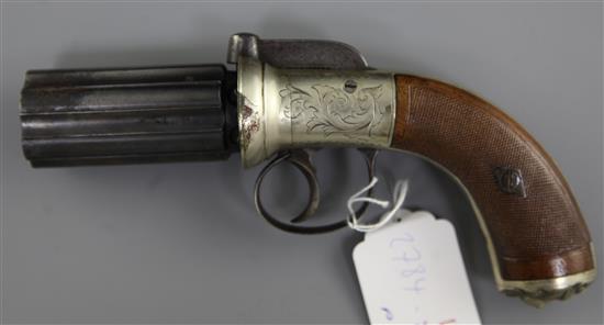 A cased percussion pepperbox six barrelled revolver, 7.75in.